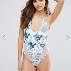 Lovin Floral Printed Swimsuit With Mesh Inserts.